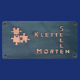 Türschild aus Kupfer, schwarz patiniert mit Puzzle-Motiv
