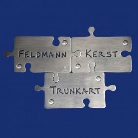 Puzzle Türschild für drei Familiennamen